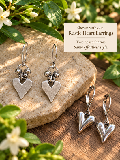 SILVER SCULPTED HEART EARRINGS